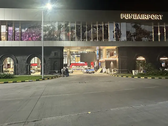 Front of Pune Airport terminal at night